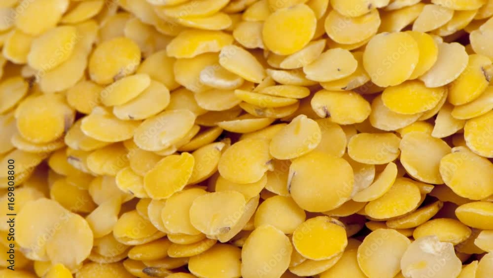 Yellow dried lentil beans close-up with zoom effect Yellow dried lentil beans close-up with zoom effect