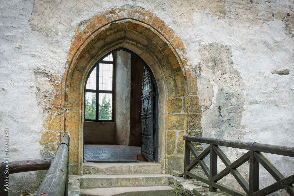 .Arch with a door in a medieval castle Bezdez. Czech Republic.