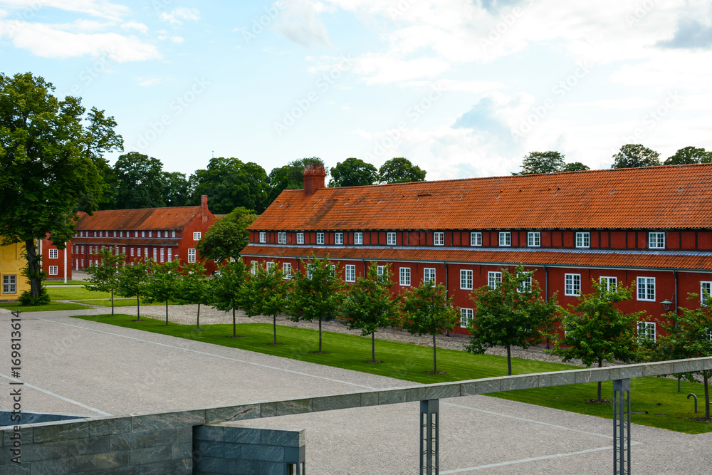 The Copenhagen Citadel (Kastellet), old red buildings in European city The Copenhagen Citadel (Kastellet), old red buildings in European city