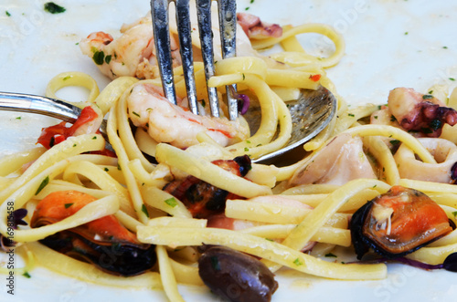 fresh italian pasta & seafood dish photo