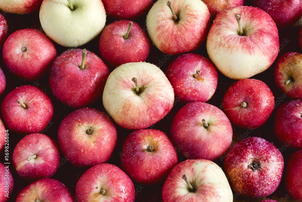 Background with small apples Wooden background Beautiful small apples Harvest background Top view Background with small apples Wooden background Beautiful small apples Harvest background Top view