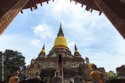 Blue sky Pagoda and Buddha status at wat yai chaimongkol,Ayuttaya Province,Thailand