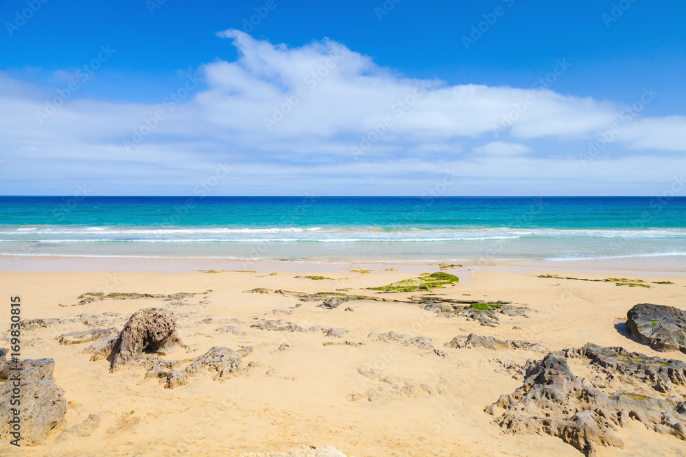 Coastal rocks on the beach of Porto Santo island Coastal rocks on the beach of Porto Santo island