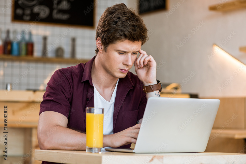 man using laptop man using laptop