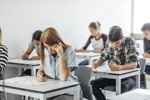 High School Students Taking Exam photo
