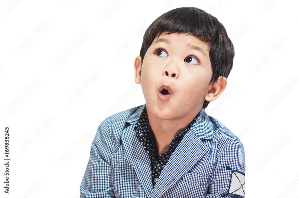 Asian boy is making expression isolated over white Asian boy is making expression isolated over white