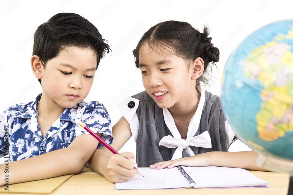 Asian kids are studying the globe over white background Asian kids are studying the globe over white background
