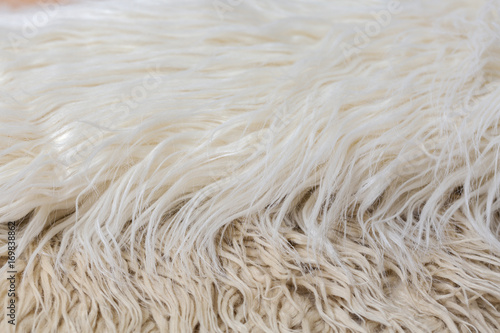 Artificial fur background white, brown, beige, cream