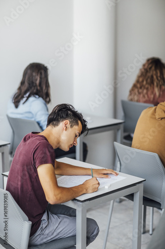 High School Students Taking an Exam © LStockStudio