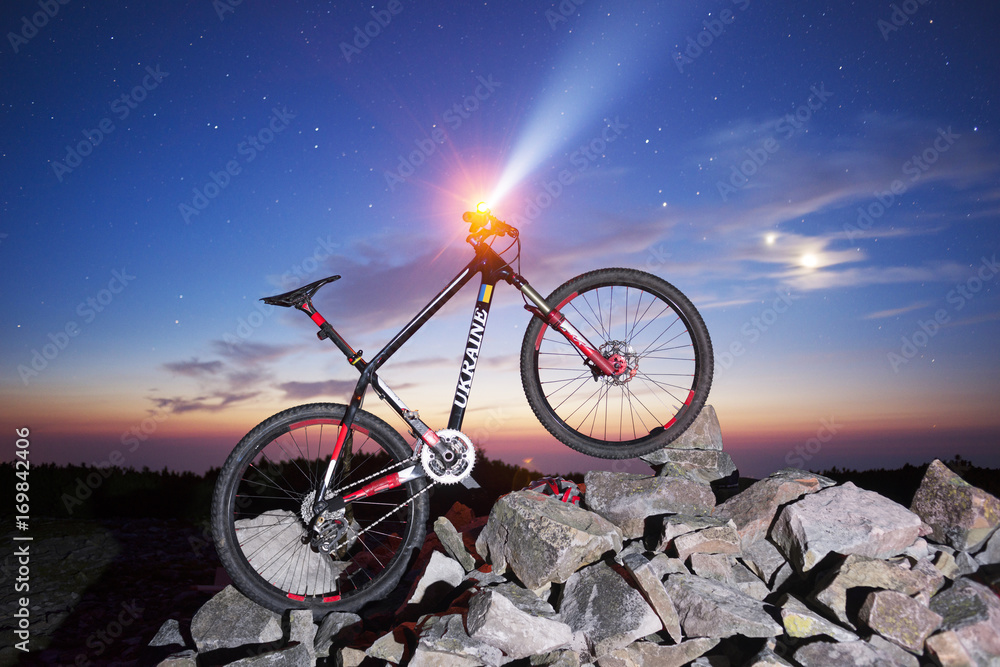 Mountain carbon bike and stars