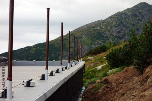 The roof of the building in a mountain environment photo