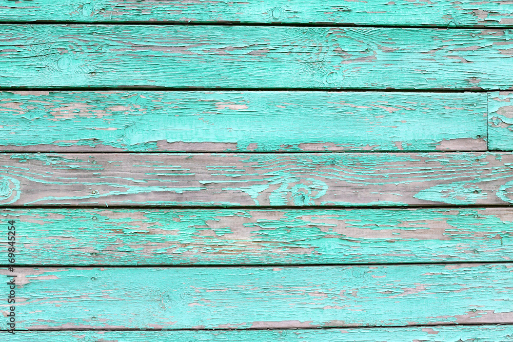 Old wooden fence. Texture of an old unpainted wood. Old wooden fence. Texture of an old unpainted wood.