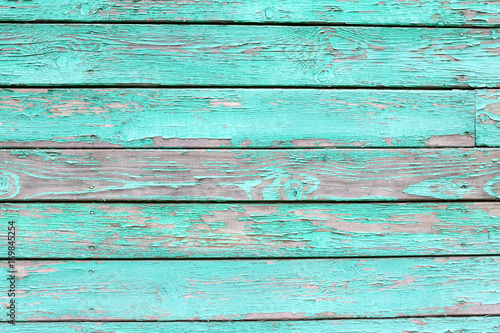 Old wooden fence. Texture of an old unpainted wood.
