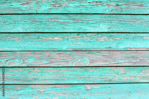 Old wooden fence. Texture of an old unpainted wood.