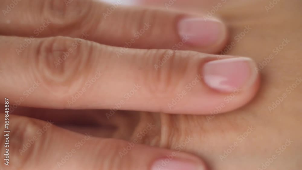 Massage of hands close up on a white background Massage of hands close up on a white background
