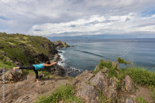 Woman Practicing Yoga on Maui Coast
