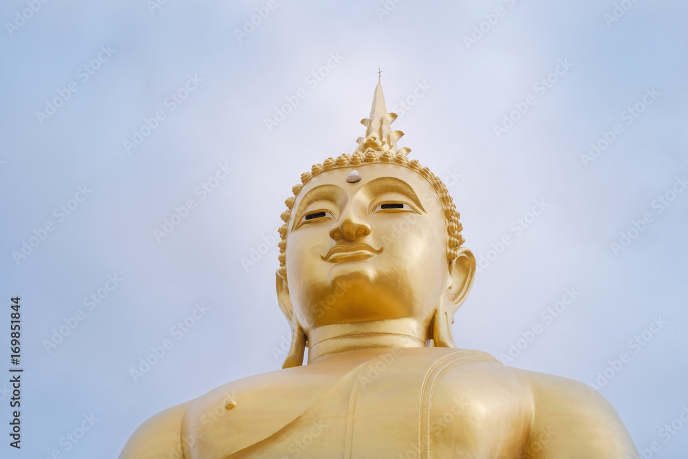 Buddha / View of statue of Buddha on blue sky background. Khao Kho, Phetchabun, Thailand.