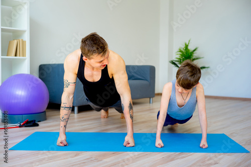 Father and son doing push ups