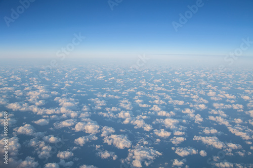 Beautiful aerial view on clouds from a plane over an Iceland. 