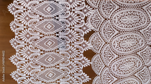 White lace fabric. Traditional work. Background.