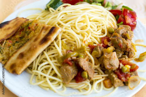 Plate with pasta and meat