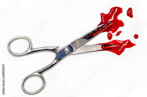scissors with blood on a white background