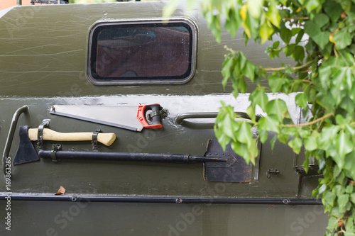 Garden tools on a military machine