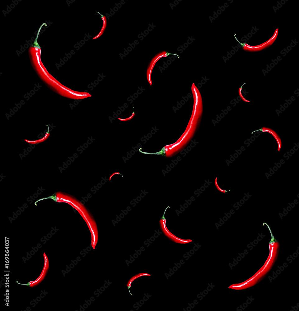Red chili peppers pattern on black background Red chili peppers pattern on black background
