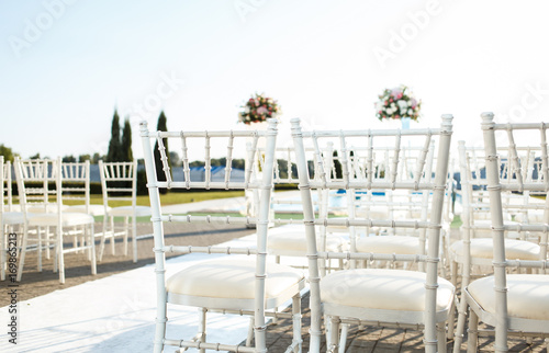 chairs for wedding guests at the ceremony photo