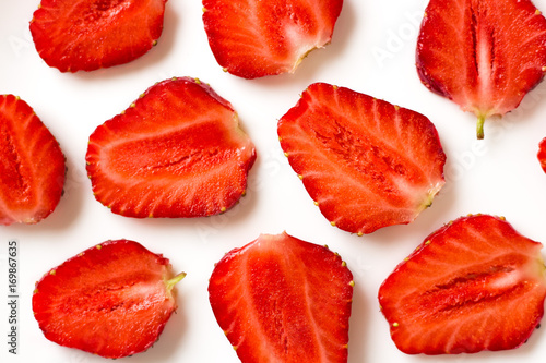 Sliced straberries on white