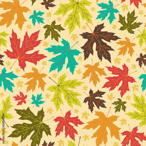 Seamless autumn pattern from bright maple leaves