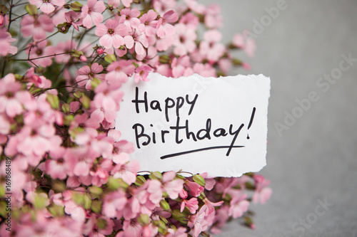 Canvas Print Happy birthday words with pink flowers