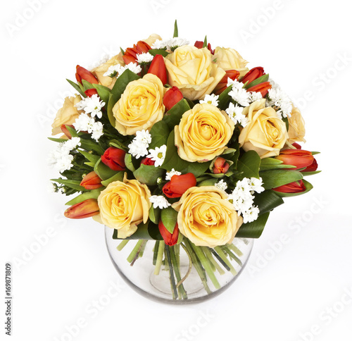 bouquet of yellow roses and red tulips in vase isolated on white background