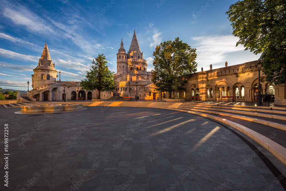 Budapest, Hungary - Morning view of the Fisherman Bastion on top of Buda Hill with beautiful lights and sky at sunrise