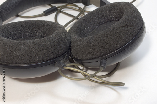 Foam circular earpads of stereo headphones closeup photo