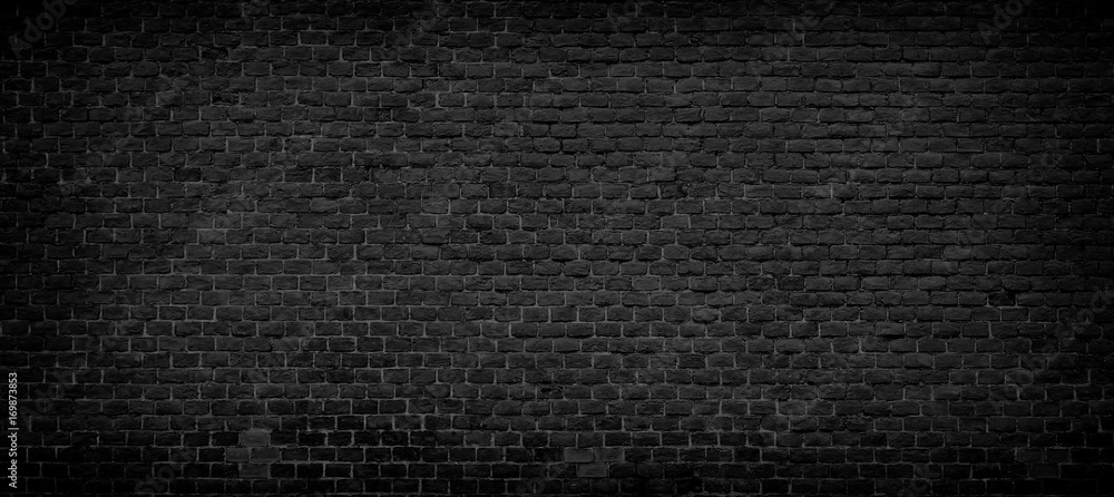Old black brick wall background. Stock Photo | Adobe Stock