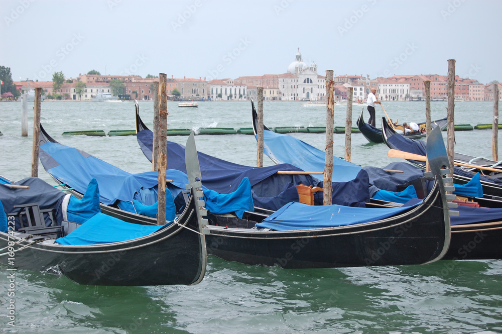 close up of gondolas tied up at piazza San Marco, Venice, Italy