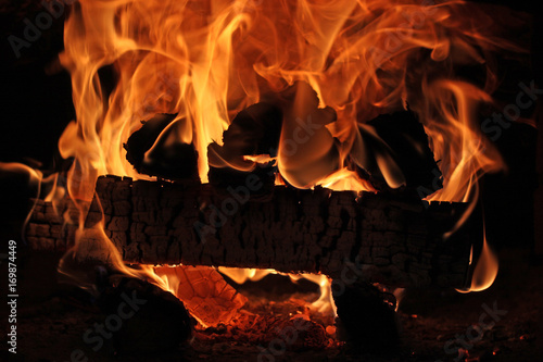 Flaming firewood in the oven