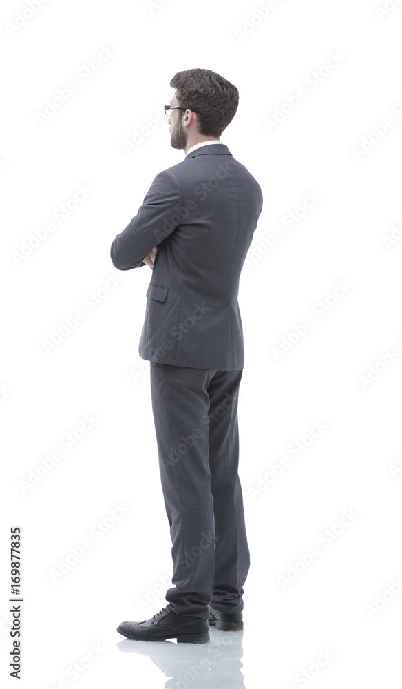 Side view in full growth - confident businessman Side view in full growth - confident businessman