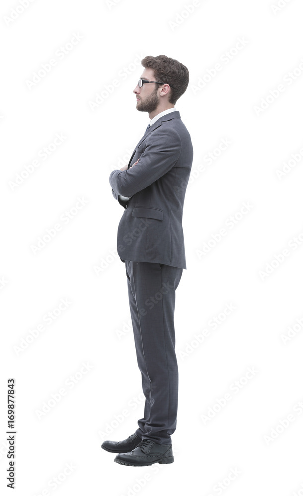 Side view in full growth - confident businessman Side view in full growth - confident businessman