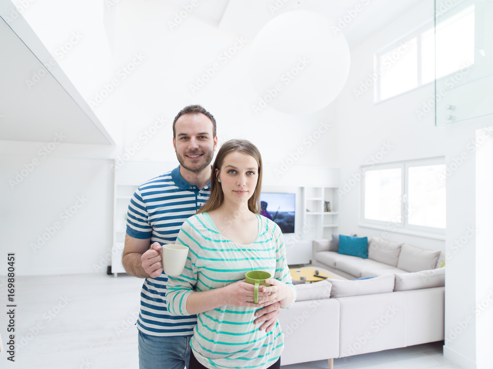 young handsome couple enjoying morning coffee young handsome couple enjoying morning coffee