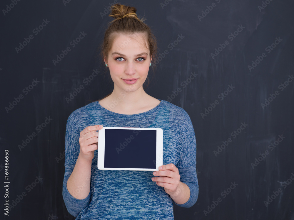 woman using tablet computer isolated over gray woman using tablet computer isolated over gray