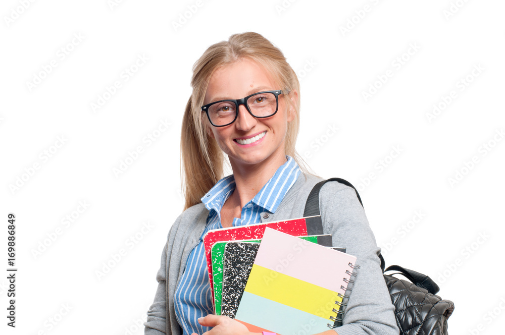 Happy young student girl holding books. Back to school Happy young student girl holding books. Back to school