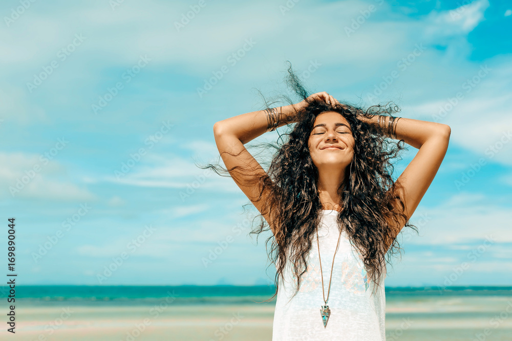 young cheerful woman having fun on the beach young cheerful woman having fun on the beach
