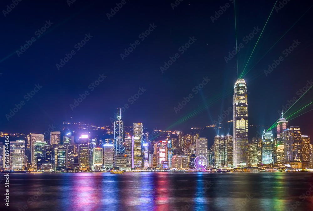 Obraz premium A Symphony of Lights show in Hong Kong. Cityscape panorama view from Victoria Harbour.