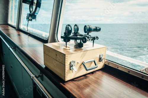 A sextant on the bridge for navigation photo