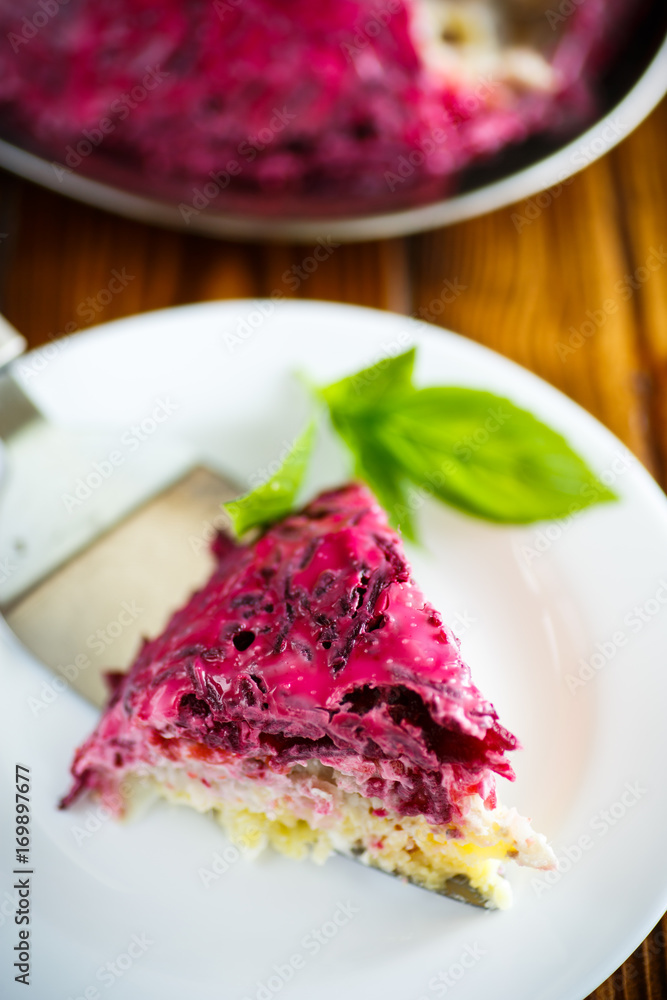 layered pastry salad with herring and beetroot layered pastry salad with herring and beetroot
