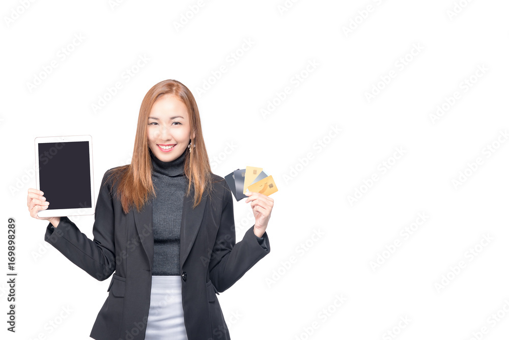 Happy asian young business woman showing credit card and tablet pc for internet shopping.isolated on white with copy space ,Add advertisement your on tablet computer