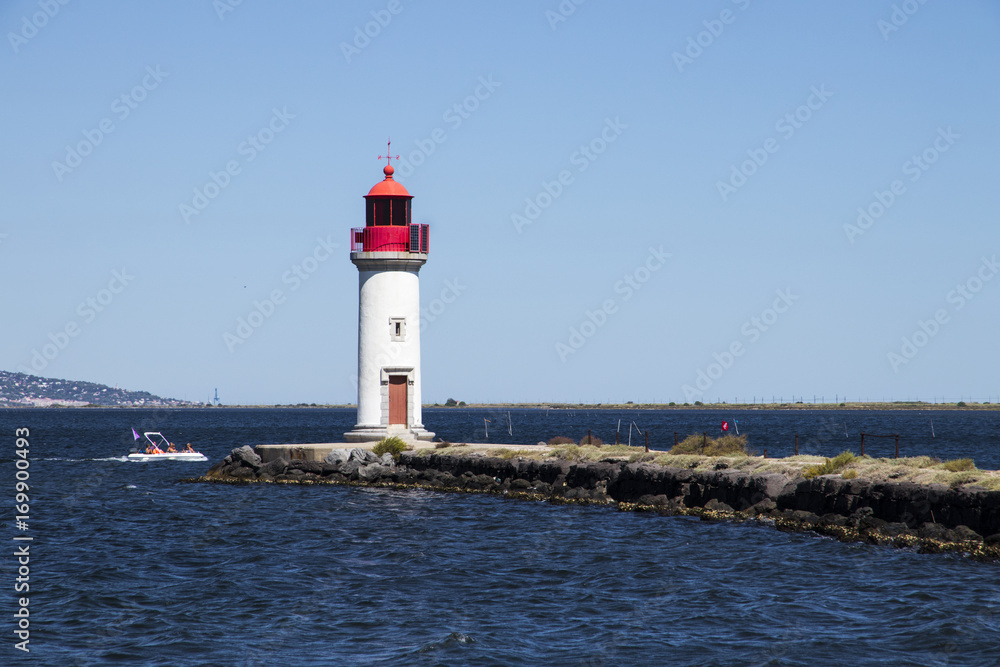 The Les Onglous lighthouse, terminating point of the Canal du Midi where the it enters the Etang de Thau. World Heritage Site. Agde, France