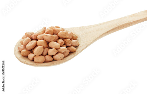 Raw peanut with wooden spoon on white background.clipping path.